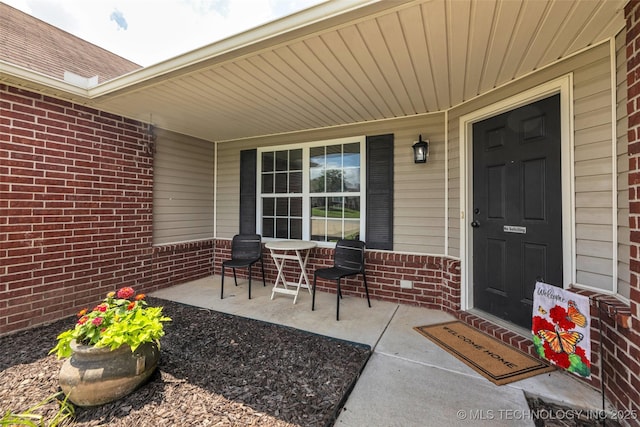 9220 S 256th E Ave, Broken Arrow, OK 74014 - view of exterior entry with a porch and brick siding