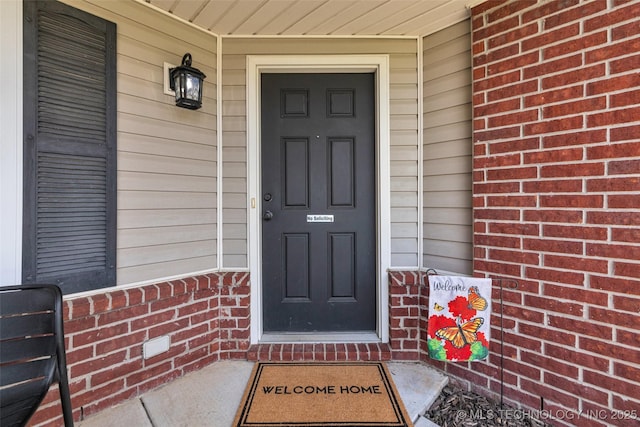 9220 S 256th E Ave, Broken Arrow, OK 74014 - view of exterior entry with brick siding and covered porch