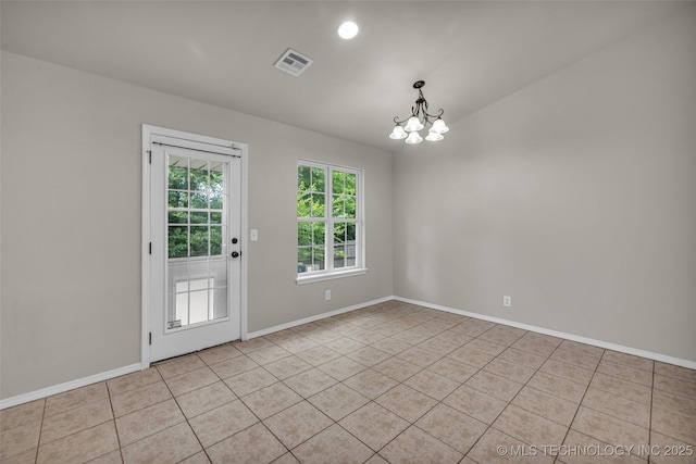 9220 S 256th E Ave, Broken Arrow, OK 74014 - unfurnished room featuring a chandelier, light tile patterned floors, and baseboards