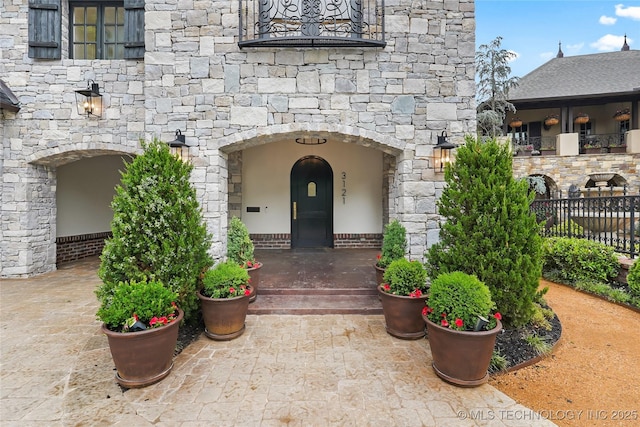 3121 S Rockford Dr, Tulsa, OK 74105 - entrance to property featuring stone siding