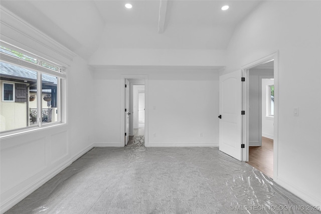 3121 S Rockford Dr, Tulsa, OK 74105 - spare room with carpet flooring, recessed lighting, baseboards, and high vaulted ceiling