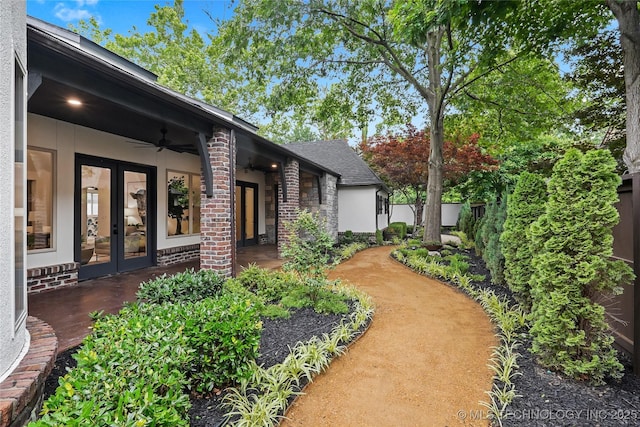 3121 S Rockford Dr, Tulsa, OK 74105 - view of yard with french doors and ceiling fan