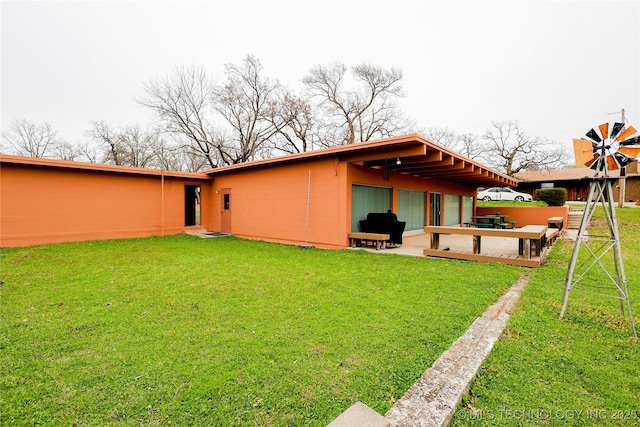 2664 Spence, Sulphur, OK 73086 - back of house featuring a patio and a lawn