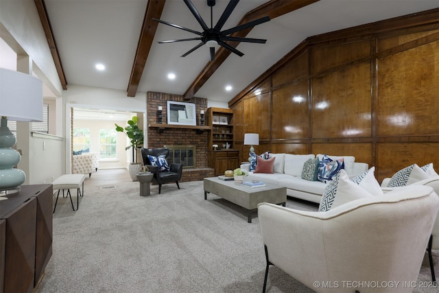 2604 W Broadway St, Broken Arrow, OK 74012 - living area with light colored carpet, a brick fireplace, ceiling fan, and recessed lighting