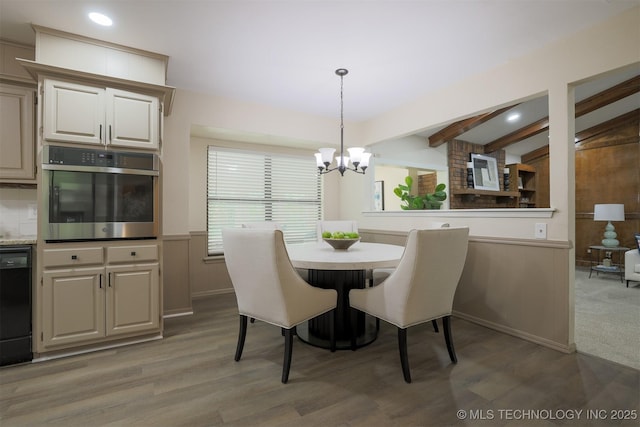 2604 W Broadway St, Broken Arrow, OK 74012 - dining room with a chandelier, beamed ceiling, light wood-type flooring, wainscoting, and recessed lighting