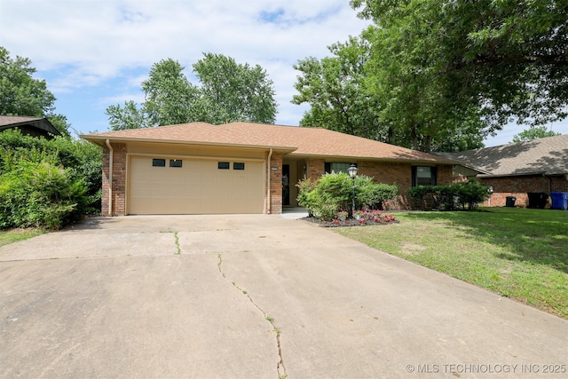 2604 W Broadway St, Broken Arrow, OK 74012 - single story home with brick siding, an attached garage, driveway, and a front lawn