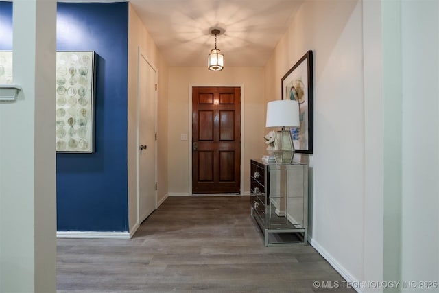 2604 W Broadway St, Broken Arrow, OK 74012 - entryway featuring wood finished floors and baseboards
