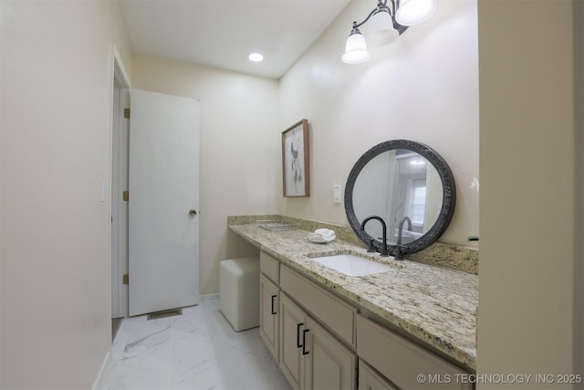 2604 W Broadway St, Broken Arrow, OK 74012 - full bath with vanity, marble look tiles, recessed lighting, and baseboards