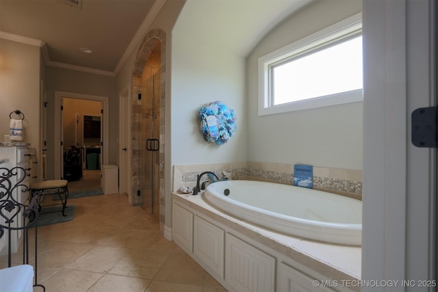 5405 E 121st Pl S, Bixby, OK 74008 - full bathroom featuring a garden tub, a stall shower, ornamental molding, and tile patterned floors
