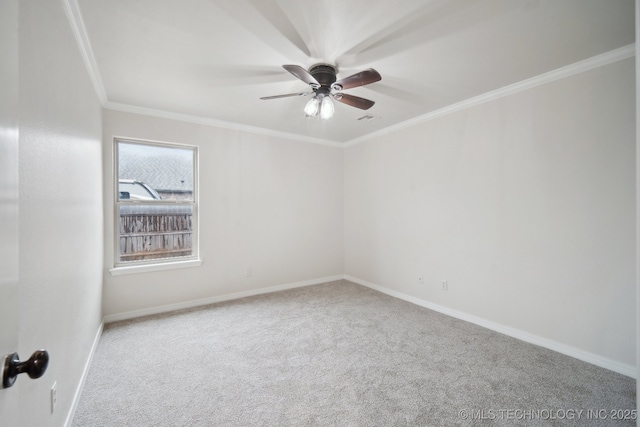 16121 E 78th St, Owasso, OK 74055 - spare room featuring a ceiling fan, carpet floors, ornamental molding, and baseboards