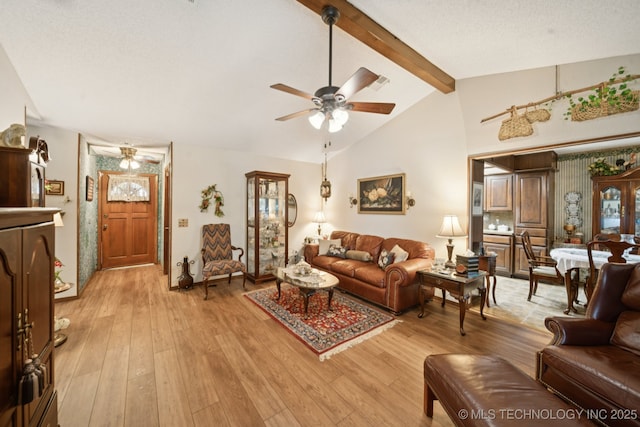3504 S Rolling Oaks Dr, Tulsa, OK 74107 - living room featuring a ceiling fan and light wood-style flooring