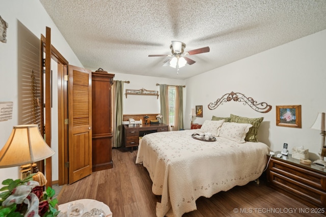 3504 S Rolling Oaks Dr, Tulsa, OK 74107 - bedroom with a textured ceiling, light wood finished floors, and ceiling fan