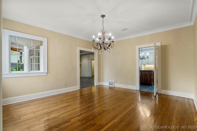 2508 Terwilleger Blvd, Tulsa, OK 74114 - unfurnished room with a chandelier, ornamental molding, wood finished floors, and baseboards