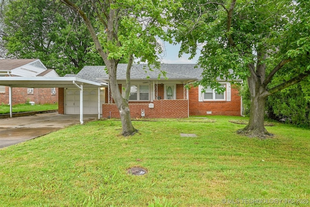 6315 E 5th Pl, Tulsa, OK 74112 - view of front facade featuring a garage, brick siding, a front yard, and driveway