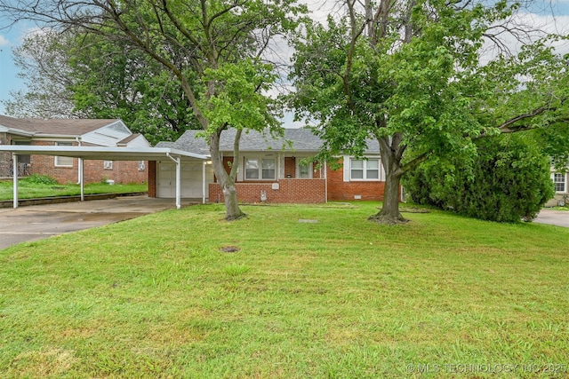6315 E 5th Pl, Tulsa, OK 74112 - ranch-style home with brick siding, an attached garage, a carport, and driveway