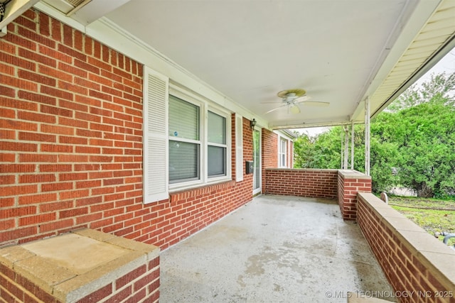 6315 E 5th Pl, Tulsa, OK 74112 - covered porch with a ceiling fan