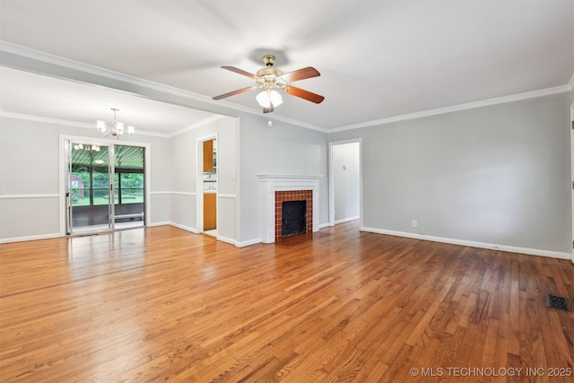 6315 E 5th Pl, Tulsa, OK 74112 - unfurnished living room with a chandelier, ceiling fan, light wood-type flooring, baseboards, and a tile fireplace