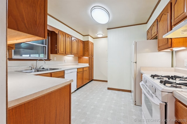 6315 E 5th Pl, Tulsa, OK 74112 - kitchen featuring white appliances, a sink, light flooring, brown cabinets, and light countertops