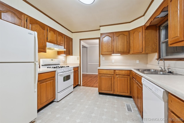 6315 E 5th Pl, Tulsa, OK 74112 - kitchen featuring white appliances, under cabinet range hood, a sink, light floors, and ornamental molding