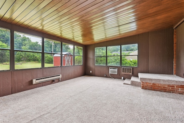 6315 E 5th Pl, Tulsa, OK 74112 - unfurnished sunroom featuring a baseboard radiator, lofted ceiling, and an AC wall unit