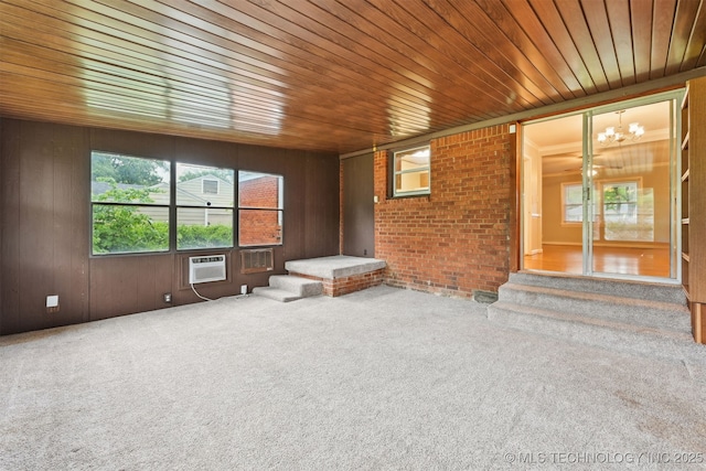 6315 E 5th Pl, Tulsa, OK 74112 - unfurnished sunroom with a chandelier and a wall mounted air conditioner