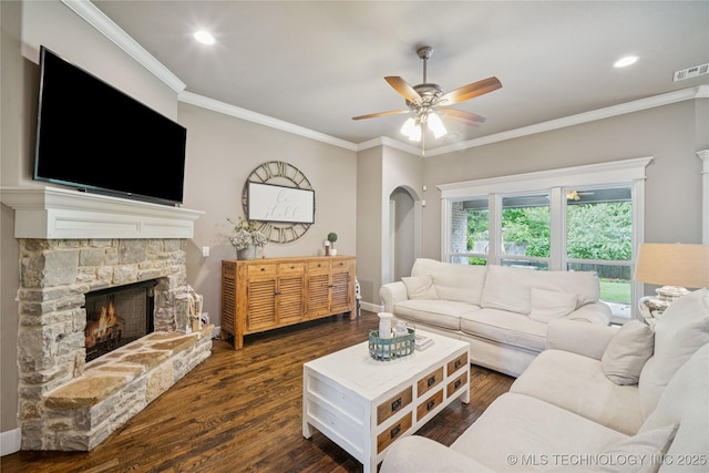 10350 E 122nd St S, Bixby, OK 74008 - living room featuring a ceiling fan, a fireplace, dark wood-style flooring, ornamental molding, and recessed lighting