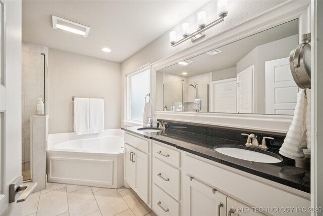 10350 E 122nd St S, Bixby, OK 74008 - bathroom with a shower stall, double vanity, tile patterned floors, and a garden tub