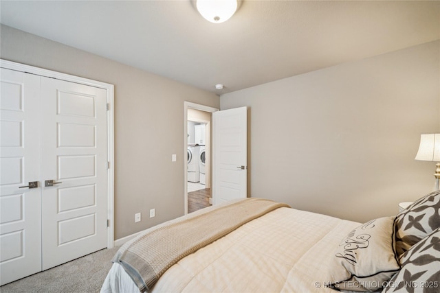 10350 E 122nd St S, Bixby, OK 74008 - bedroom featuring washing machine and clothes dryer and carpet