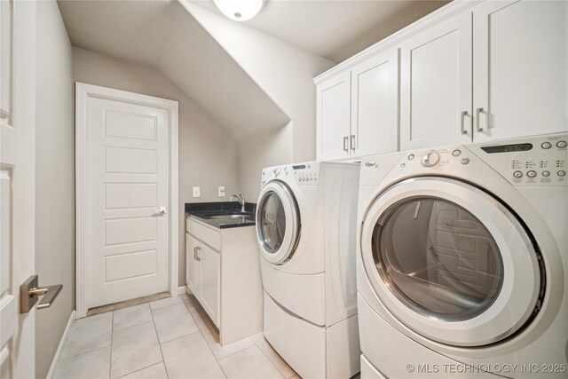 10350 E 122nd St S, Bixby, OK 74008 - washroom with cabinet space, separate washer and dryer, light tile patterned flooring, and baseboards