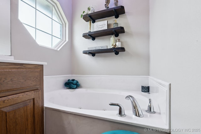 13 Cedar St, Kiefer, OK 74041 - full bathroom featuring a tub with jets and vanity