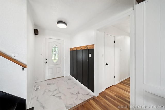 321 W 50th Pl, Sand Springs, OK 74063 - entryway with baseboards and wood finished floors