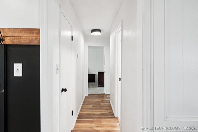 321 W 50th Pl, Sand Springs, OK 74063 - corridor featuring light wood-type flooring