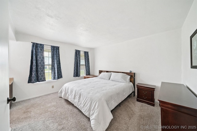 321 W 50th Pl, Sand Springs, OK 74063 - carpeted bedroom with baseboards