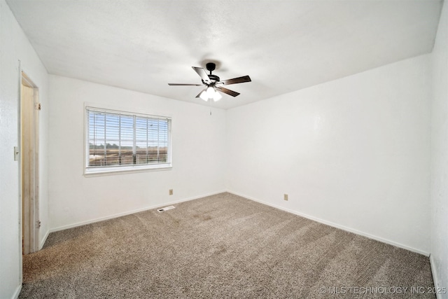 321 W 50th Pl, Sand Springs, OK 74063 - spare room featuring carpet, ceiling fan, and baseboards