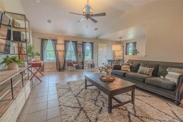 2800 N 20th St, Broken Arrow, OK 74012 - living area featuring lofted ceiling, plenty of natural light, a ceiling fan, and baseboards