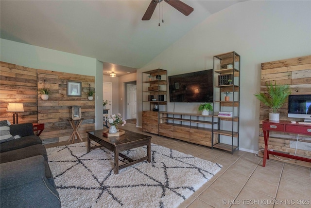 2800 N 20th St, Broken Arrow, OK 74012 - tiled living room with wooden walls, ceiling fan, and high vaulted ceiling