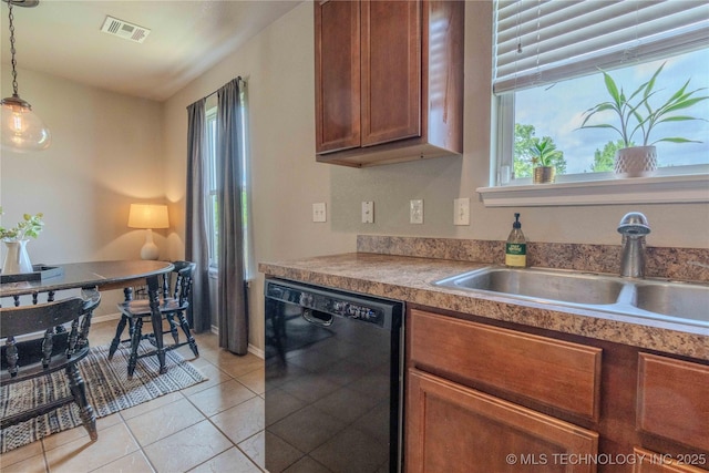 2800 N 20th St, Broken Arrow, OK 74012 - kitchen with dishwasher, a sink, light tile patterned flooring, pendant lighting, and brown cabinets