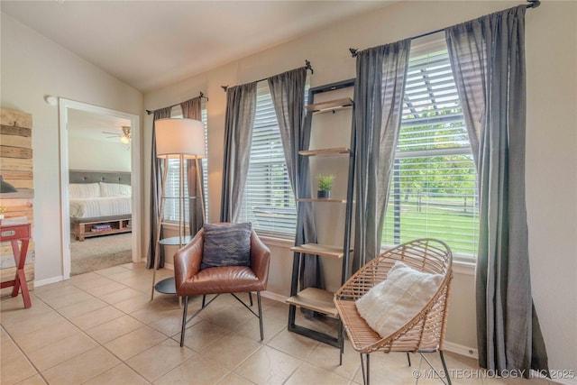 2800 N 20th St, Broken Arrow, OK 74012 - living area with healthy amount of natural light, light tile patterned floors, baseboards, and vaulted ceiling