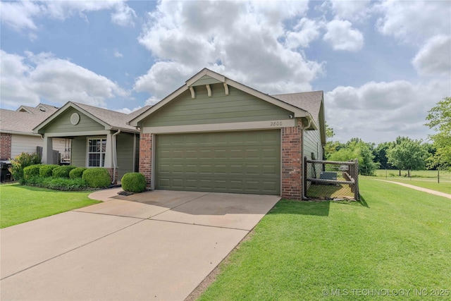 2800 N 20th St, Broken Arrow, OK 74012 - ranch-style house with an attached garage, driveway, a front lawn, and brick siding
