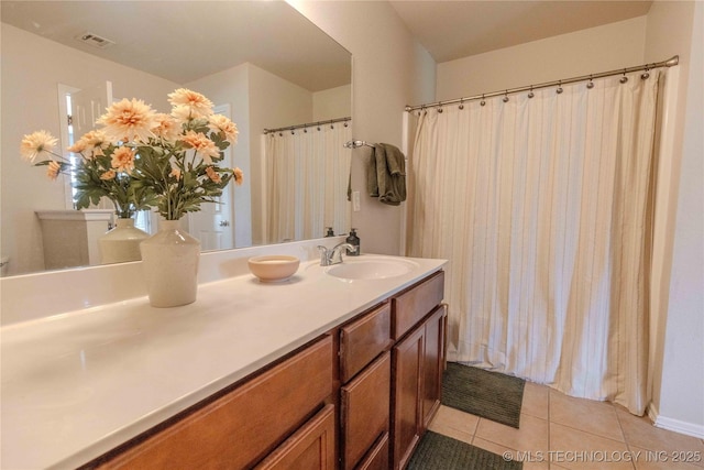 2800 N 20th St, Broken Arrow, OK 74012 - bathroom with tile patterned flooring, vanity, and curtained shower