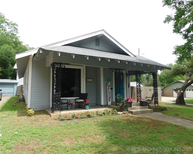 700 D St NW, Ardmore, OK 73401 - view of front of property with covered porch and a front yard