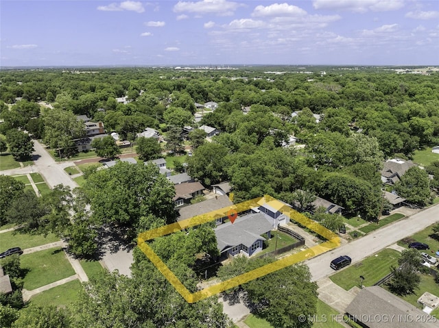 700 D St NW, Ardmore, OK 73401 - drone / aerial view of a heavily wooded area