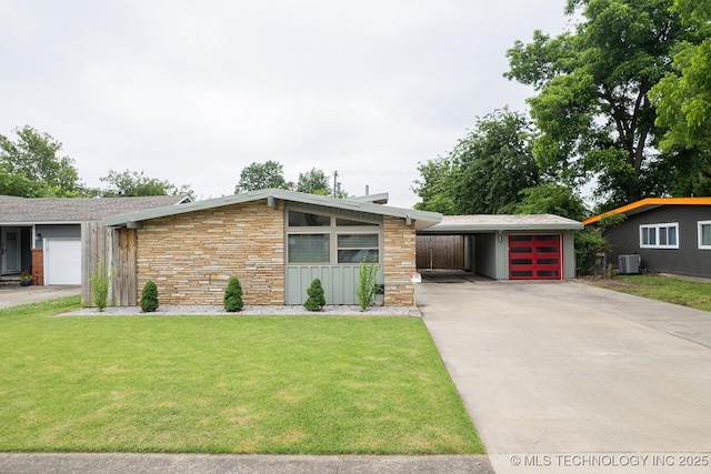 5770 E 26th St, Tulsa, OK 74114 - mid-century modern home with stone siding, a carport, driveway, central AC unit, and a front yard