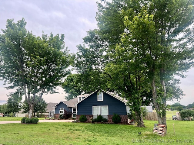 915 Aspenwood St, Cleveland, OK 74020 - view of front of property featuring brick siding