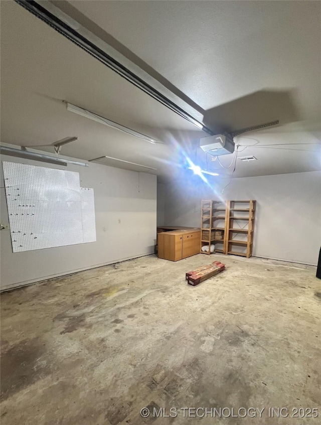 915 Aspenwood St, Cleveland, OK 74020 - garage with a garage door opener