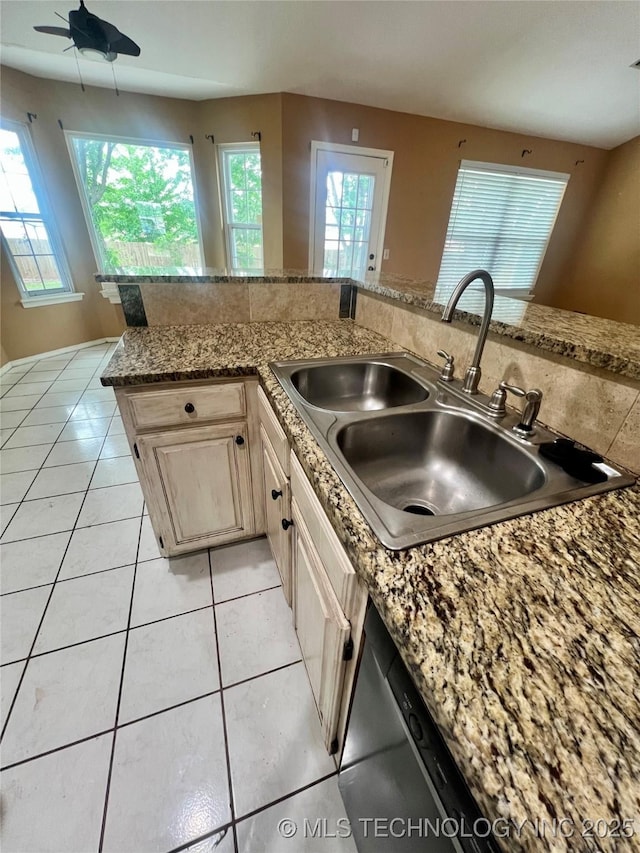 915 Aspenwood St, Cleveland, OK 74020 - kitchen with a sink, light tile patterned flooring, plenty of natural light, and ceiling fan