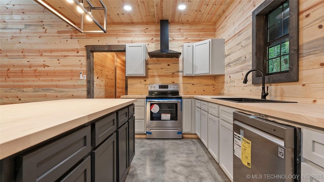 4396 E Cheadle Rd, Milburn, OK 73450 - kitchen featuring appliances with stainless steel finishes, island range hood, wooden walls, wooden counters, and wooden ceiling