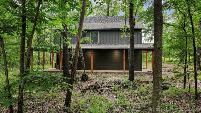 4396 E Cheadle Rd, Milburn, OK 73450 - view of property exterior with a shingled roof