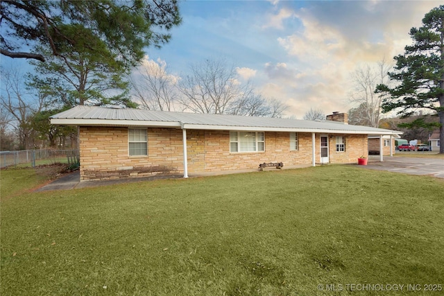 200 S K St, Quinton, OK 74561 - view of front of home with a chimney, metal roof, and stone siding