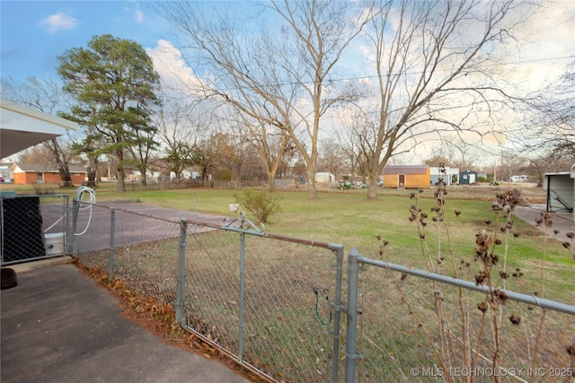 200 S K St, Quinton, OK 74561 - view of yard featuring a gate and central AC unit